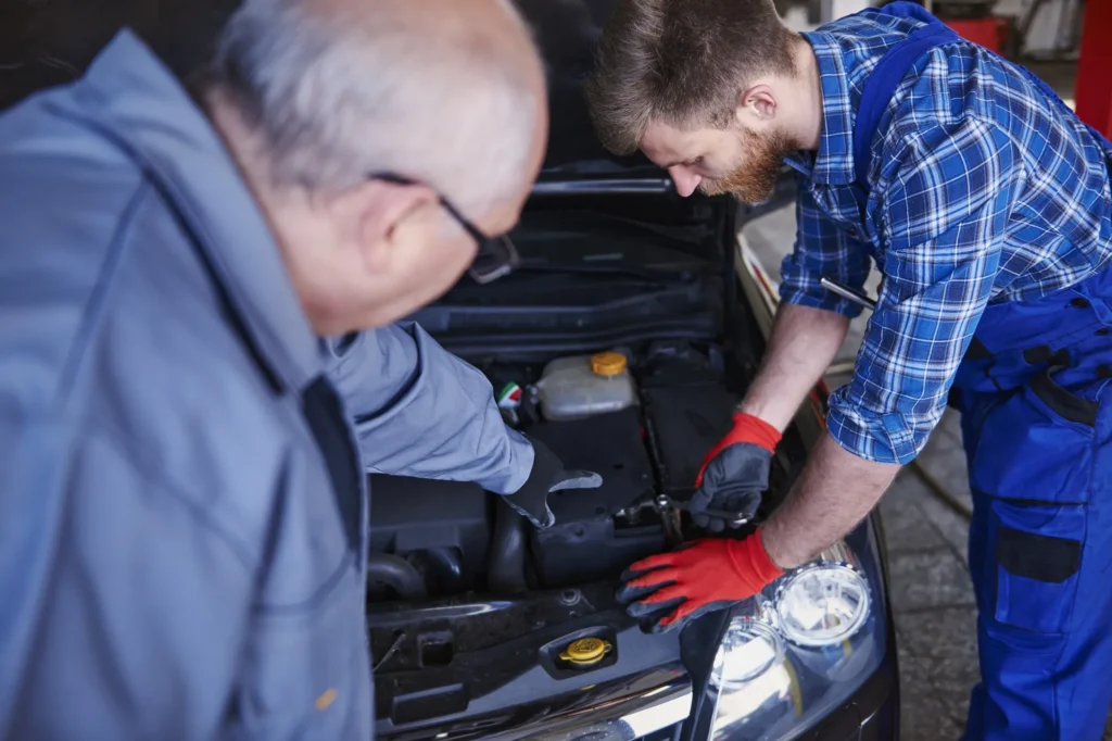 Automotive locksmith repairing car ignition in San Antonio, Texas.